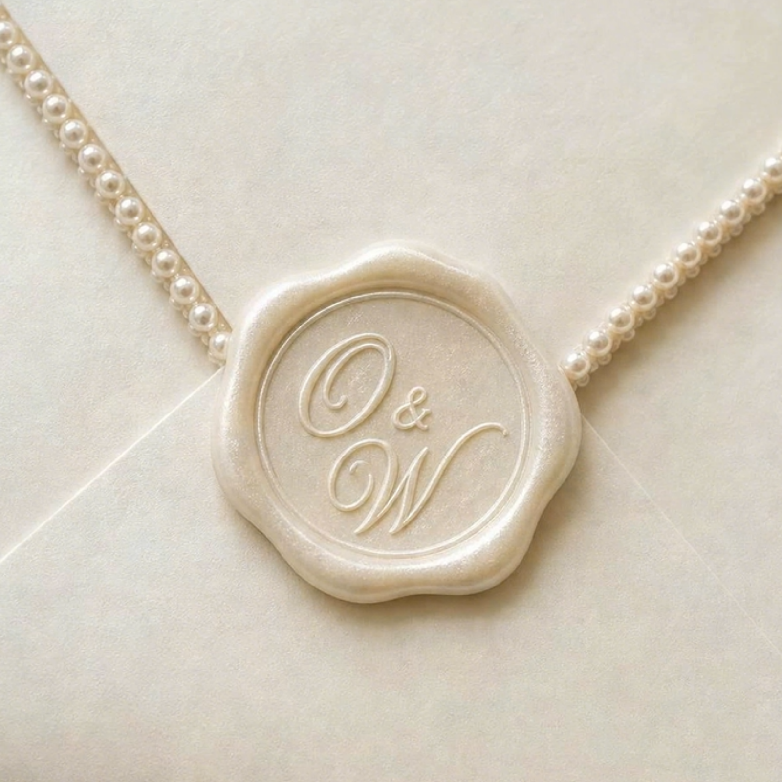 Olga and Wayne wedding invitation wax seal